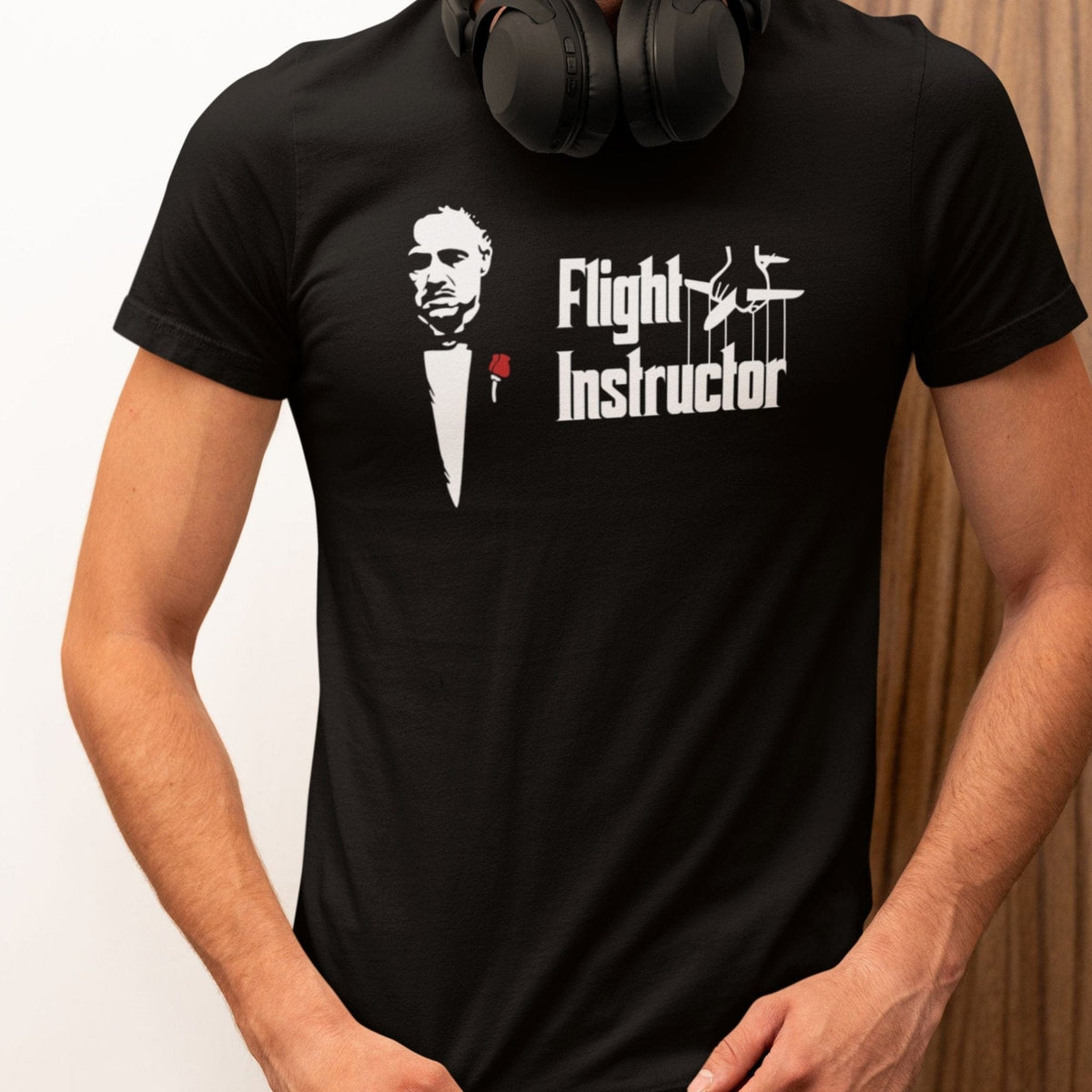 Man wearing a black Flight Instructor T-shirt