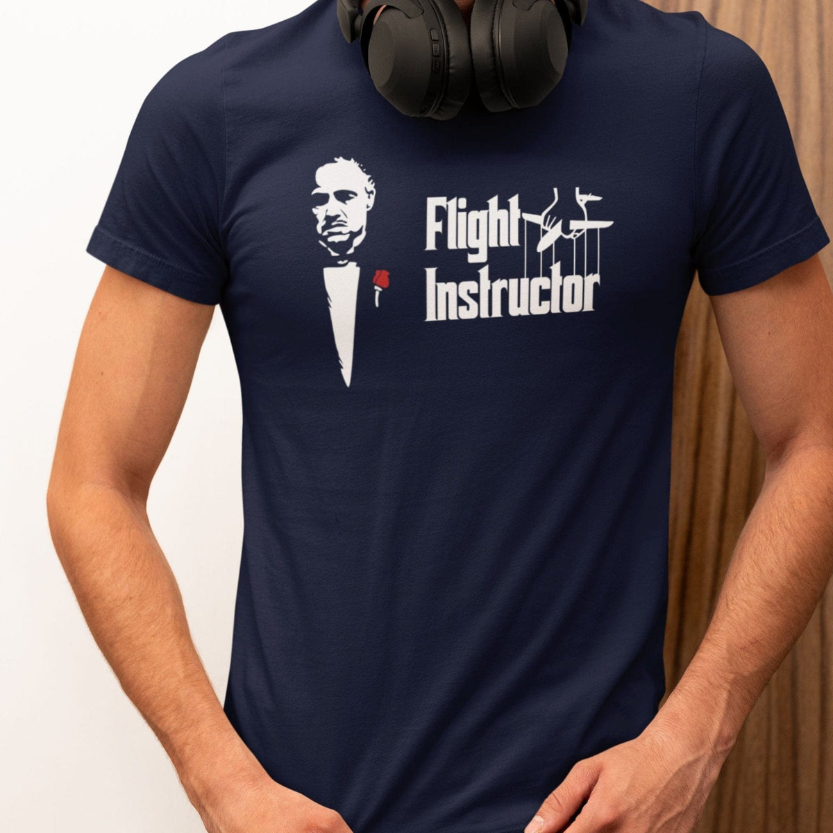 Woman wearing a navy Flight Instructor T-shirt