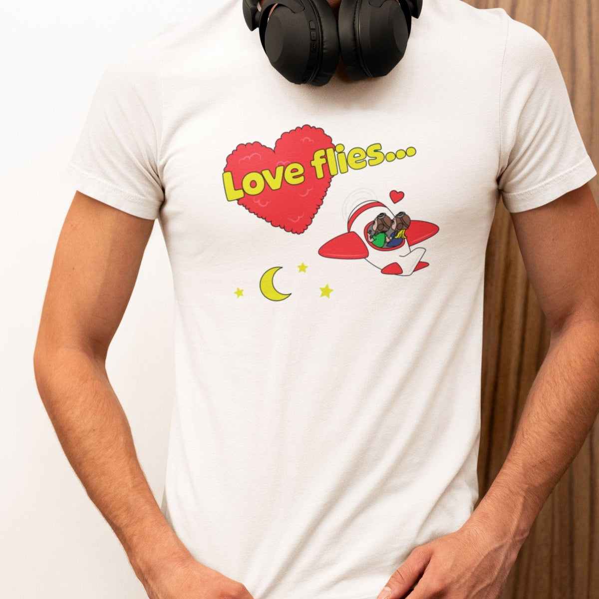 Woman wearing a white Love Flies V2 pilot T-shirt