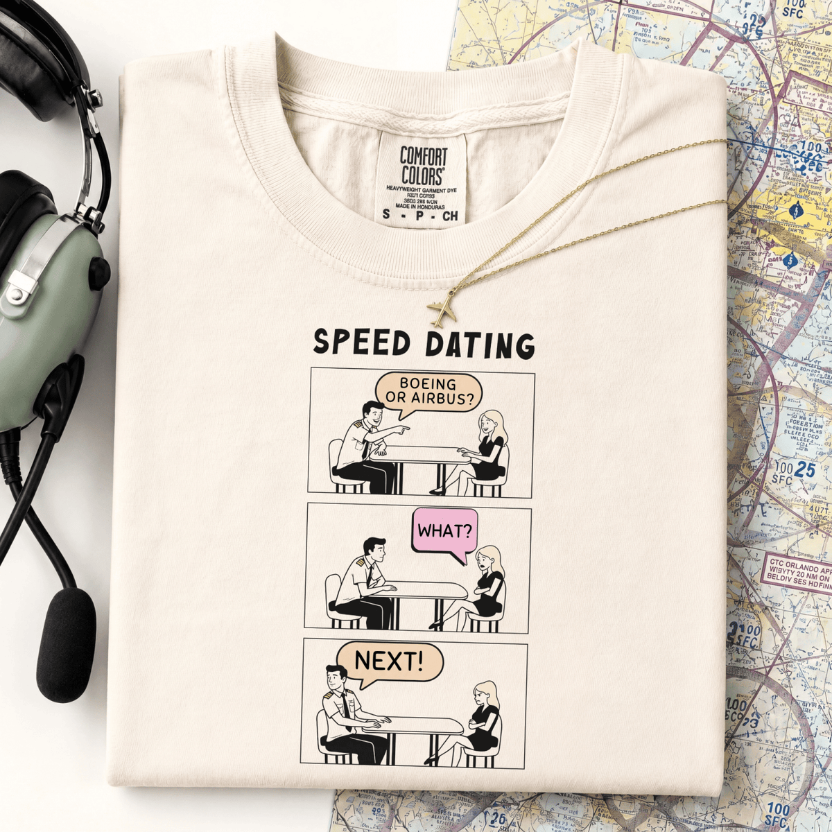 Folded Boeing or Airbus Speed Dating aviation T-shirt on a chart