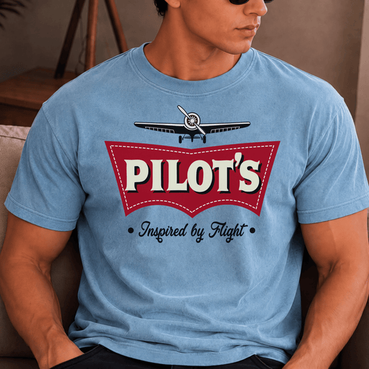 Man wearing a blue Pilot's Inspired by Flight airplane T-shirt