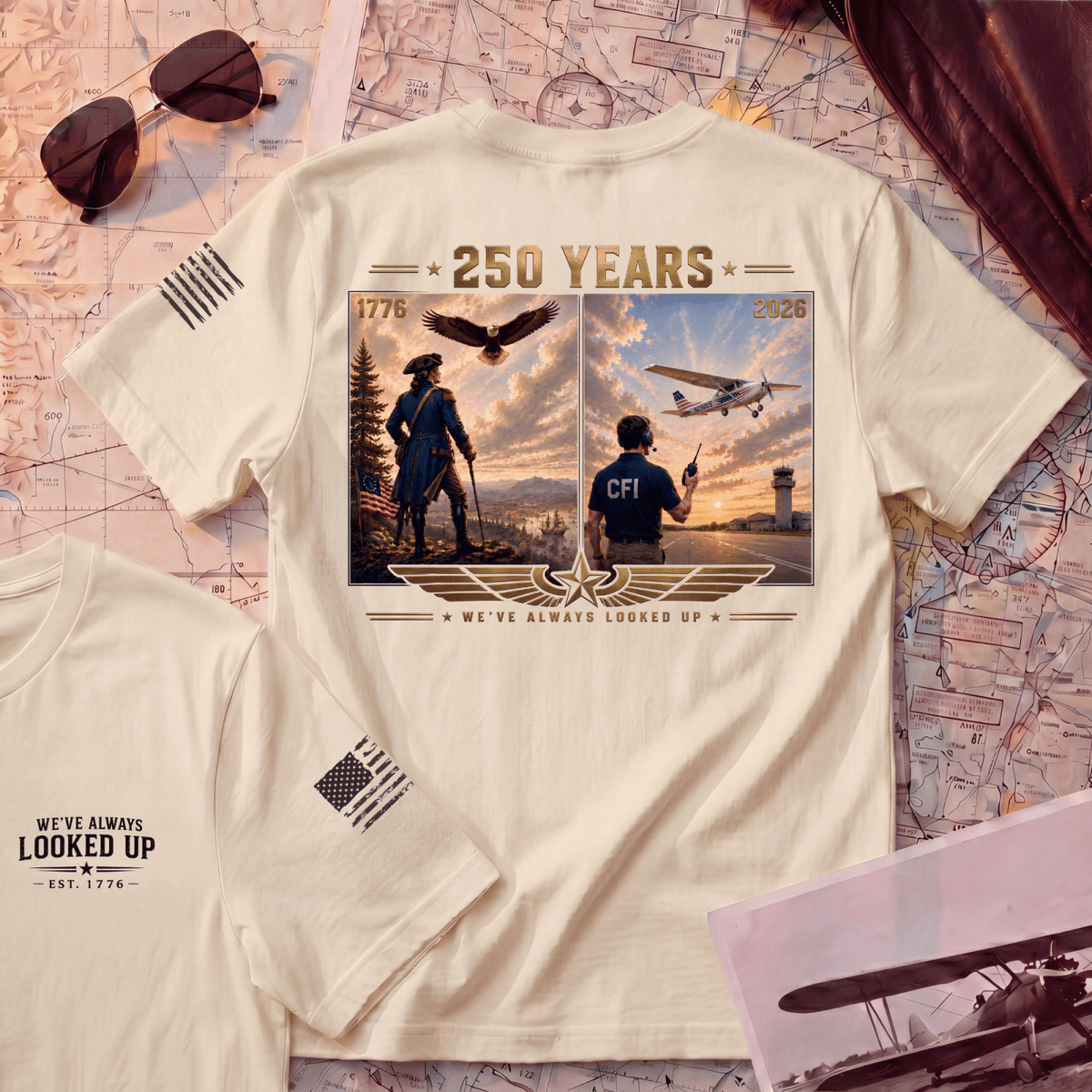 Natural Still Looking Up 250th aviation T-shirt flat lay
