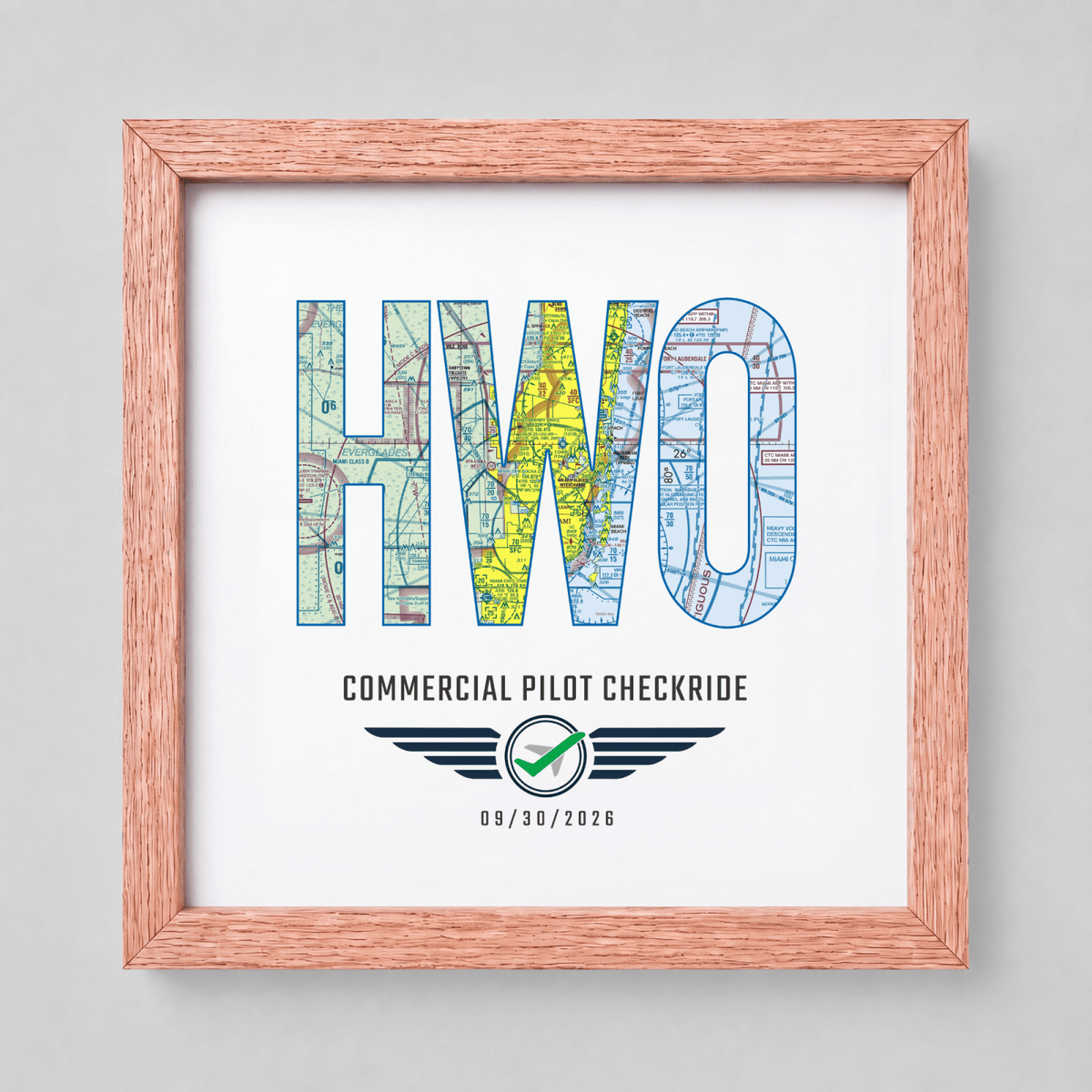 Wood-framed HWO airport code VFR chart print celebrating a commercial pilot checkride