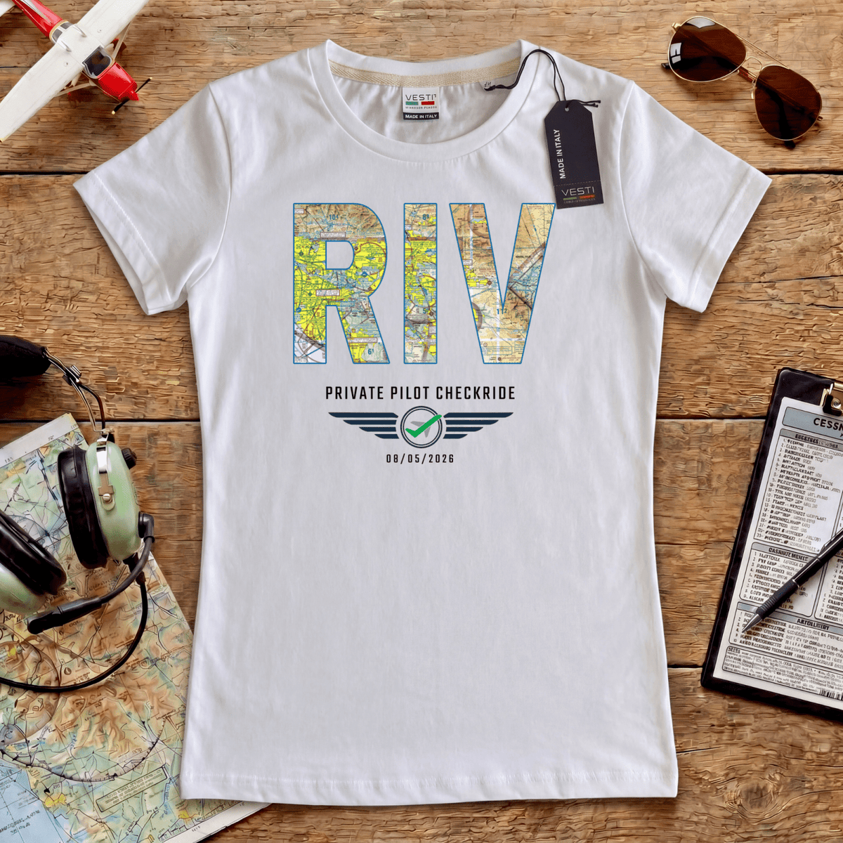 White RIV airport code T-shirt with sectional chart lettering and a private pilot checkride milestone